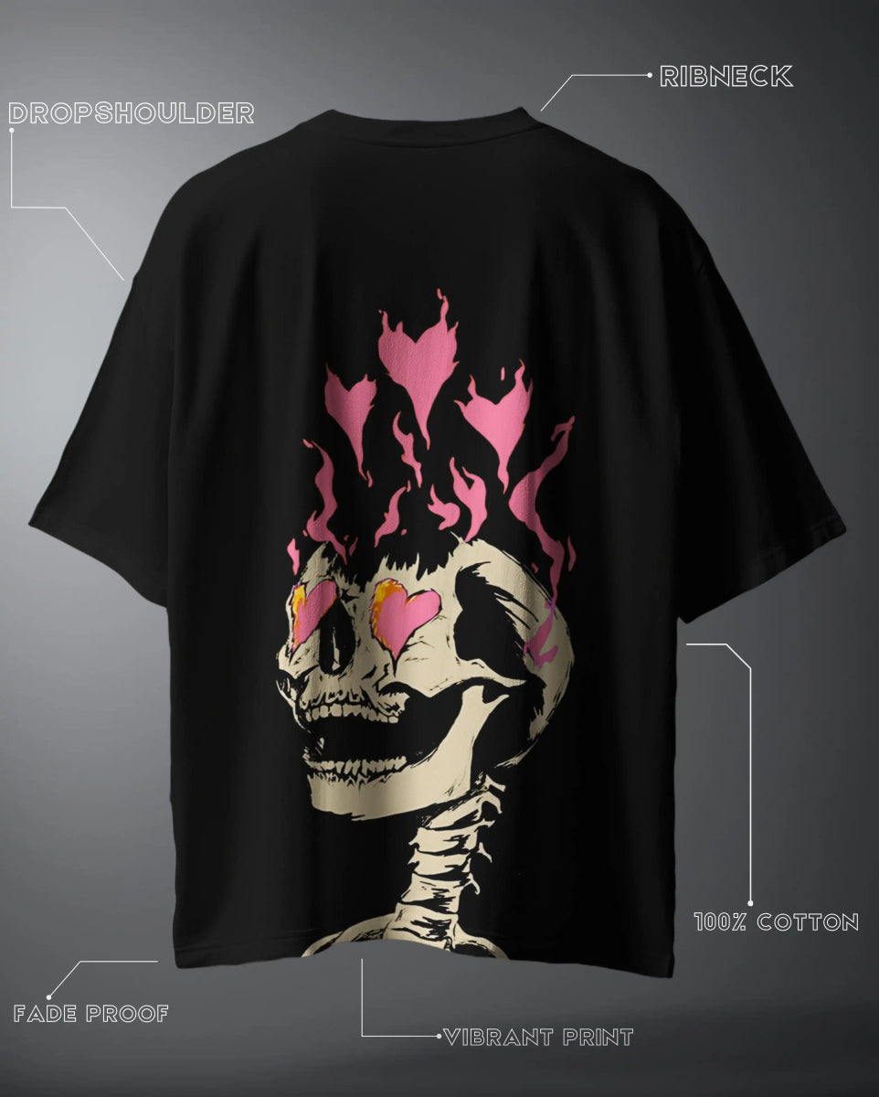 Black oversized graphic t-shirt by WEEBTOON featuring a skeleton with pink heart eyes and flames on the back