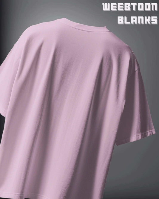 WEEBTOON unisex blank oversized t-shirt in light pink displayed on a mannequin with soft fabric texture